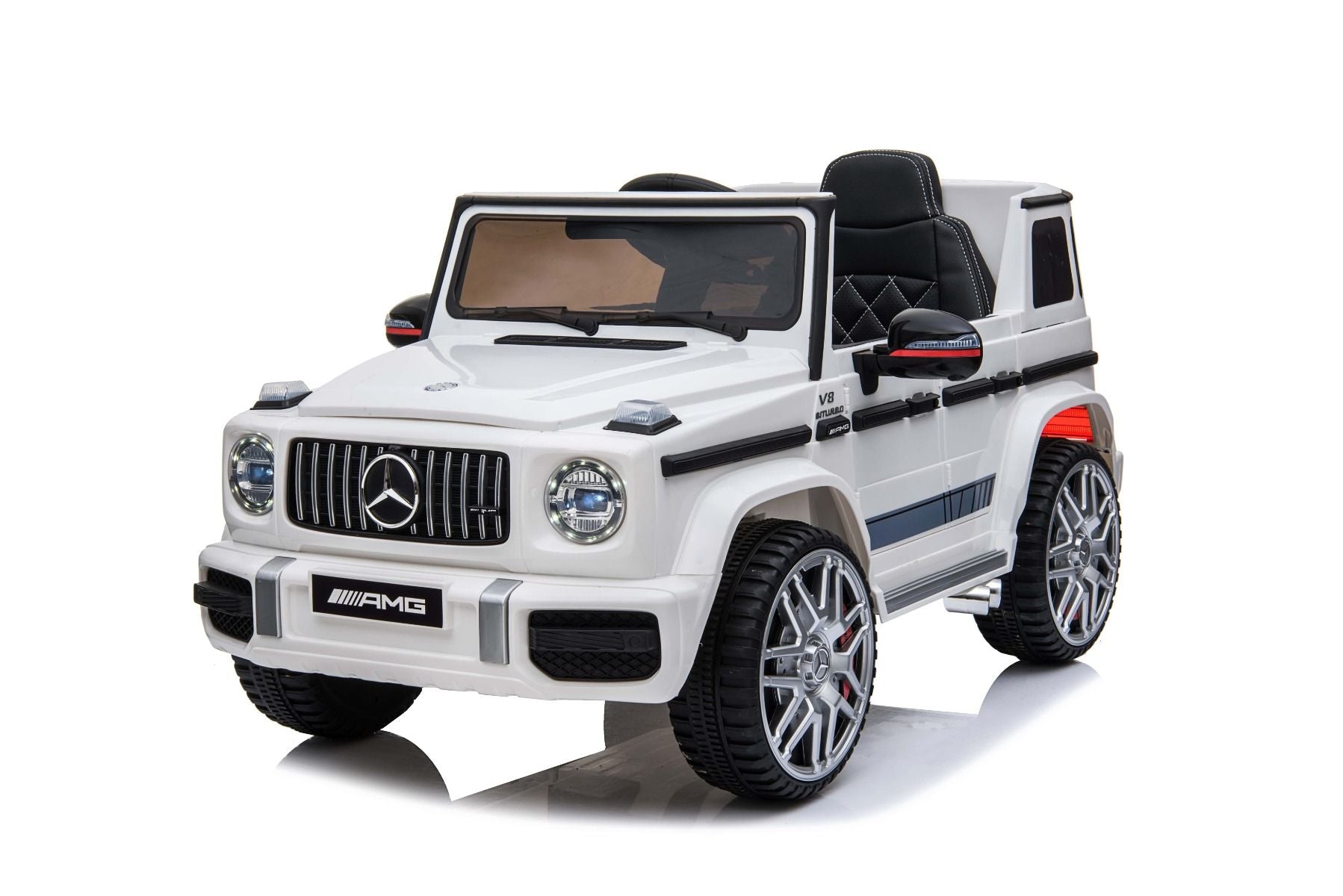 Elektroauto kinder Mercedes G Neu, Weiß, Originallizenz, Batteriebetrieben, Türen öffnen, Einzelsitz, 2x Motor, 12 V Batterie, 2,4 GHz Fernbedienung, Hinterradfederung, Sanfter Start