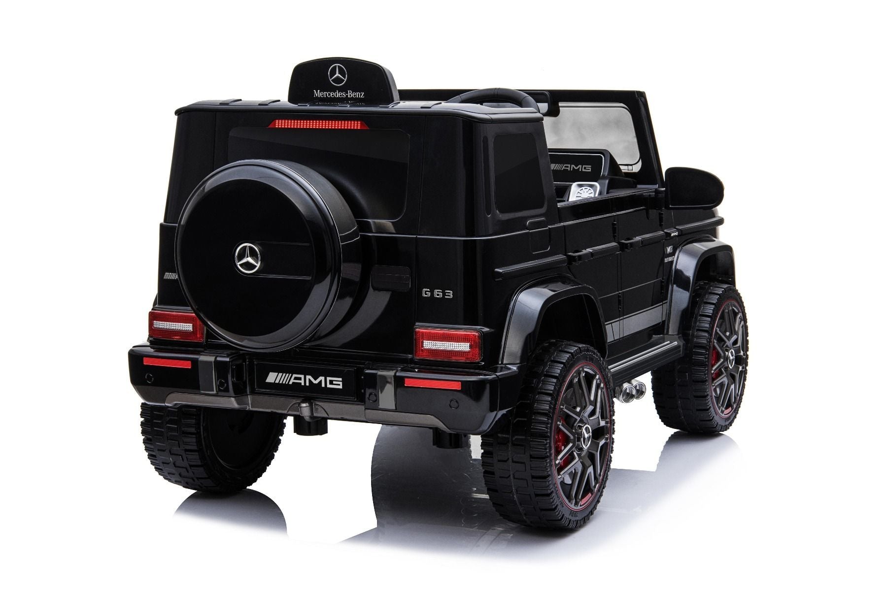 Elektroauto kinder Mercedes G Neu, Schwarz, Originallizenz, Batteriebetrieben, Türen öffnen, Einzelsitz, 2x Motor, 12 V Batterie, 2,4 GHz Fernbedienung, Hinterradfederung, Sanfter Start