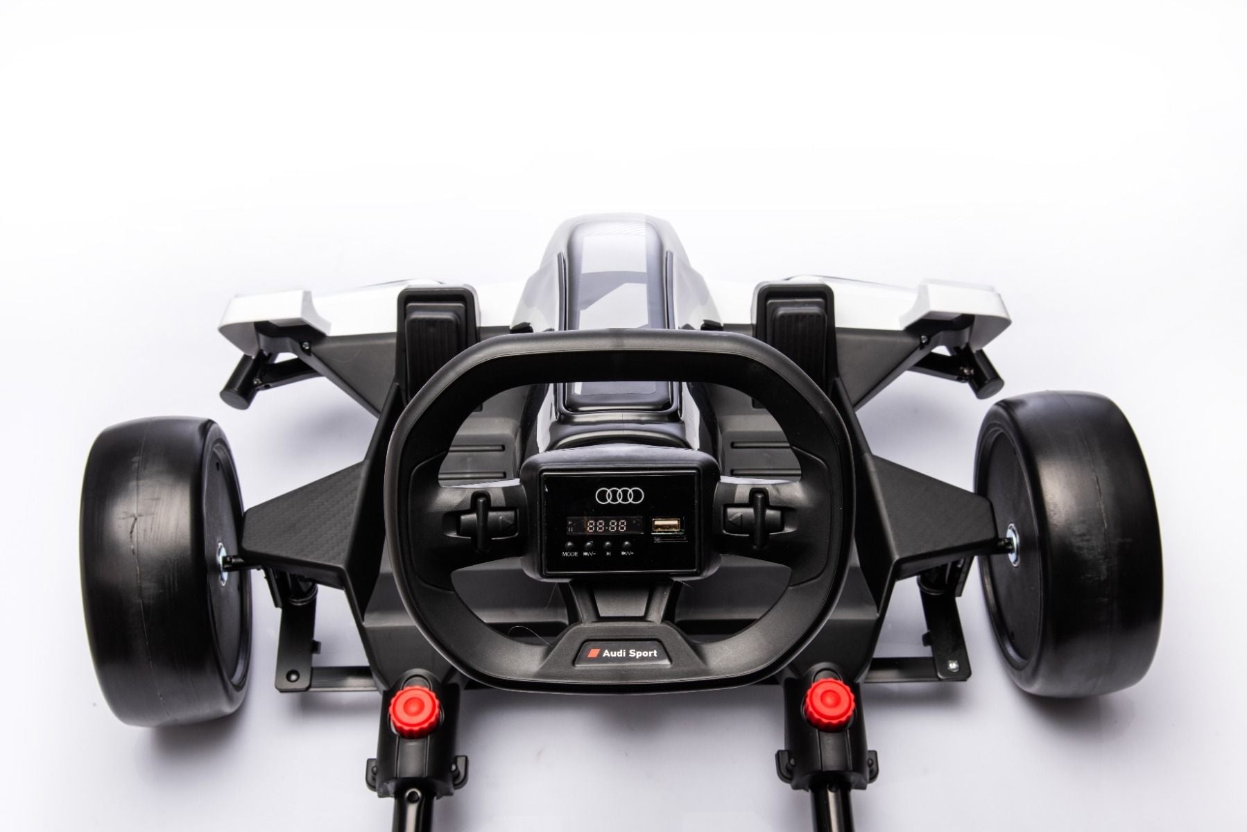 Lizenziertes Aufsitz-Driftkart AUDI 24 V, weiß, LED-Beleuchtung, 2 x 150 W Motor, Driftmodus mit einer Geschwindigkeit von 12 km/h, 24 V Batterie, solide Stahlkonstruktion, verstellbarer Sitz, MP3-Player