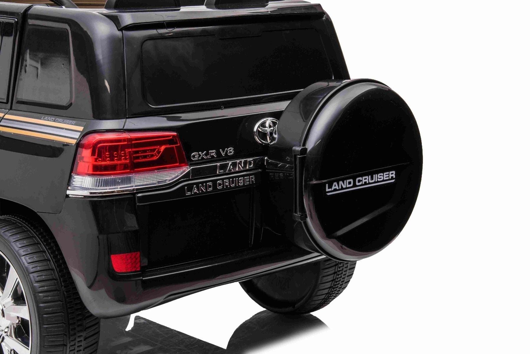 Kinder-Elektroauto Toyota Landcruiser 12V, SCHWARZ, Kunstledersitz, 12V/7AH-Akku, Öffnende Türen, 2 x 35W-Motor, 2.4GHz-Fernbedienung, weiche EVA-Räder, Federung, Sanftanlauf, MP3-Player mit USB-/AUX-Eingang, lizenziert