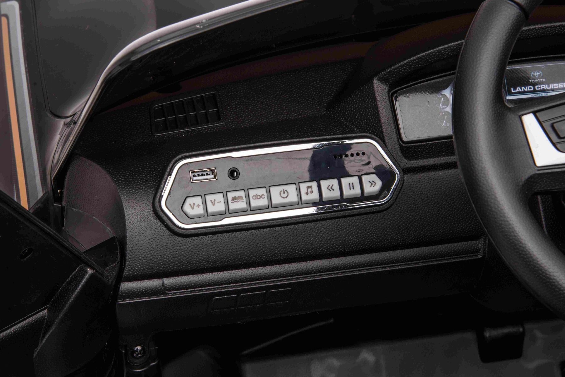 Kinder-Elektroauto Toyota Landcruiser 12V, SCHWARZ, Kunstledersitz, 12V/7AH-Akku, Öffnende Türen, 2 x 35W-Motor, 2.4GHz-Fernbedienung, weiche EVA-Räder, Federung, Sanftanlauf, MP3-Player mit USB-/AUX-Eingang, lizenziert